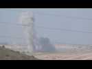 Israeli tanks on Gaza-Israel border as smoke rises after strikes