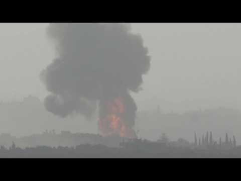 Fireball after huge strike in northern Gaza seen from Israel