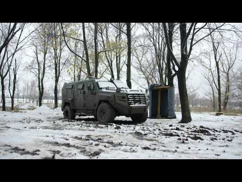 First snow falls in east Ukraine as Russian invasion drags into winter