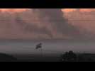 Sun sets in northern Gaza as a lull in fighting approaches
