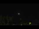 Helicopters transporting freed hostages fly over Israeli air base