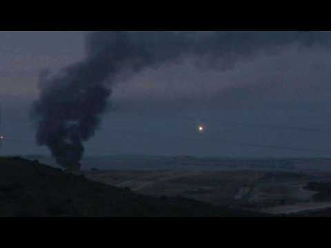 Flare and smoke over northern Gaza skyline as truce holds for second day