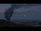 Flare and smoke over northern Gaza skyline as truce holds for second day