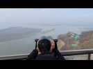 North Korea seen from across border after it launches spy satellite