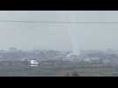 Rockets launched from Gaza, smoke billows