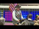 Iowa caucus: Republicans drop ballots into a bucket