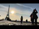 Snow surrounds Paris' Eiffel Tower