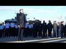 France's Macron attends flag-raising ceremony at naval base