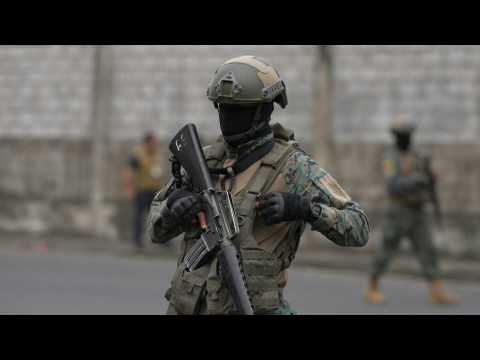 Scene outside Ecuador military base where family of fugitive 'Fito' is being held