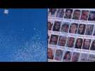 Israeli army drops leaflets in Rafah bearing portraits of hostages
