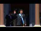 Argentina's president Milei greets supporters from balcony