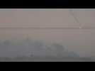 Flares seen over the northern Gaza Strip as smoke billows