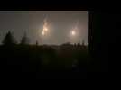 Flares light up sky at night in Gaza City