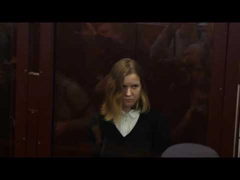 Russian cafe bomb suspect appears in court as trial opens