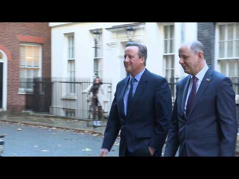 Ex UK PM David Cameron leaves 10 Downing St after being appointed foreign secretary