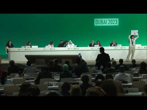 Activist crashes COP28 event demanding an end to fossil fuels