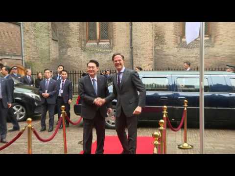 South Korean President Yoon Suk Yeol is welcomed by Dutch PM Rutte