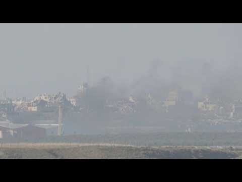 Smoke billows over northern Gaza, seen from Israeli border