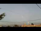 Rocket barrage fired at Jerusalem seen over Gaza City