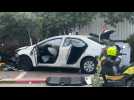 Israeli forces inspect damaged car following suspected attack in central Israel