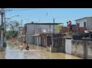 In Brazil, Rio's suburb residents face torrential rains