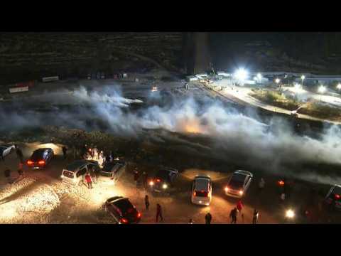 Israeli forces clash with Palestinians outside Ofer prison ahead of prisoner release