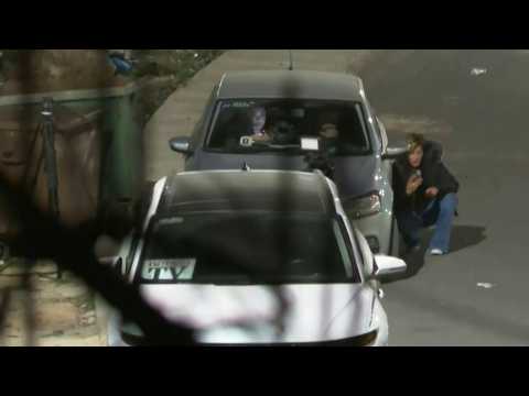 Journalists take cover during clashes outside Ofer prison
