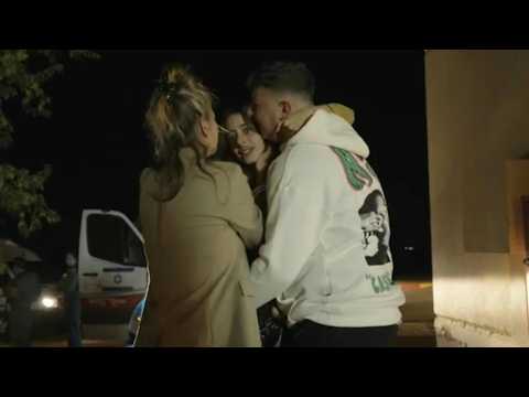 French-Israeli hostage Mia Shem hugs relatives upon arrival at army base