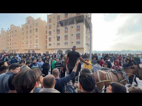 Locals at scene of airstrike near Khan Yunis, southern Gaza