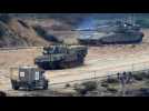Israeli military vehicles manoeuver near near the Gaza border