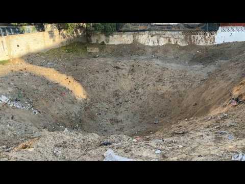 Smoke, crater following Israeli strike in Gaza's Khan Yunis