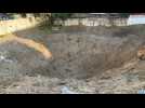 Smoke, crater following Israeli strike in Gaza's Khan Yunis