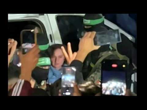Hamas gunmen handover two Russian women hostages to the Red Cross in Gaza's Khan Yunis