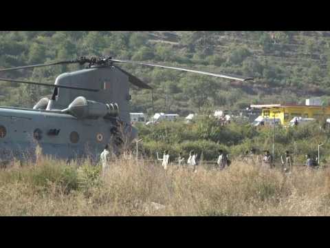 Rescued Indian workers board helicopter to be airlifted to hospital in Rishikesh