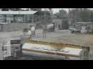 Tank trucks head to UN fuel depot for loading at Rafah crossing