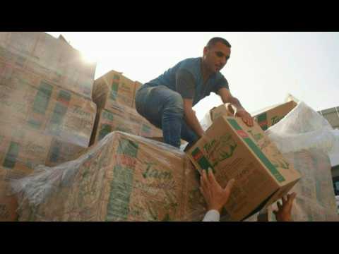 Food aid arrives at UNRWA school in Rafah, South Gaza