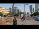 Relatives of Hamas hostages run for cover as sirens sound in Tel Aviv
