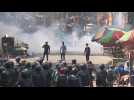 Bangladesh garment workers clash with police in violent protest