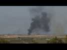 Smoke rises after munitions explode in the northern Gaza strip