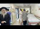 Patients rush to shelter after air-raid sirens sound in Jerusalem