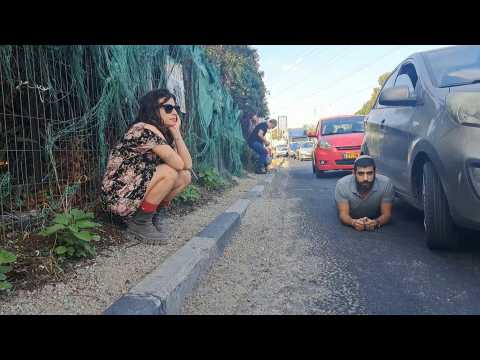 Israelis take shelter as rocket alert wails in Tel Aviv