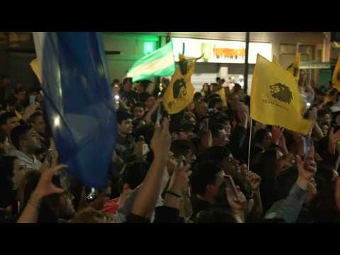 Supporters of Argentina's Milei celebrate partial poll results
