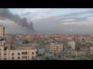 Smoke billows over Gaza City as 23rd day of war ends