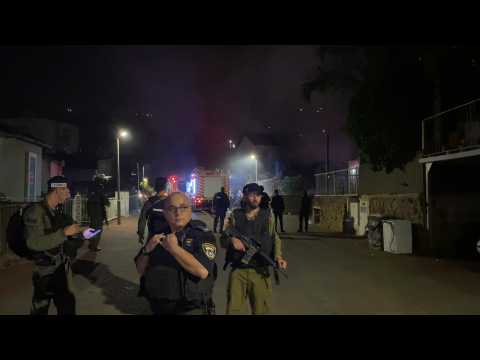 Israeli emergency services at rocket impact site near Lebanon border