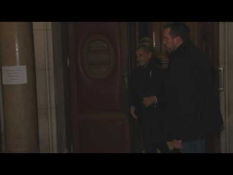 France's Sarkozy exits courthouse at end of appeal trial