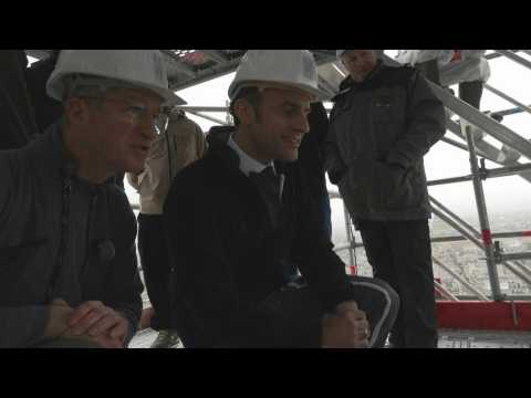 French President visits construction site at Paris's Notre Dame, one year before its reopening