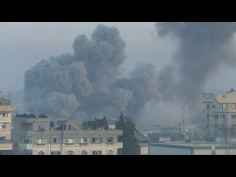 Large cloud of smoke rises over buildings after strike on Gaza's Rafah