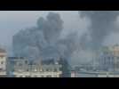 Large cloud of smoke rises over buildings after strike on Gaza's Rafah