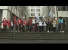 Fearing bankruptcy, employees of French food giant Casino rally for protest
