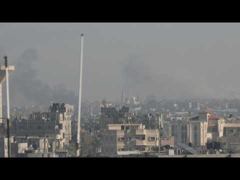 Smoke rises over Khan Yunis, seen from Rafah